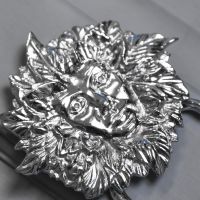 Close-Up of Bright Chrome Finish on Maiden Door Knocker