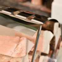 Bright Chrome Moon Log Holder Holding Logs