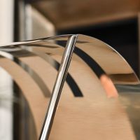 Close-up of the Bright Chrome Finish on the Moon Log Holder