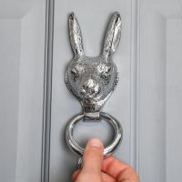 Scale Shot of Bright Chrome Rabbit Door Knocker 