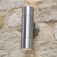 Brushed Aluminium Spotlight Cylinder Wall Light in Situ on a Stone Wall