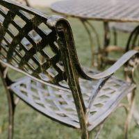 Close up of Lattice Chair on the Brushed Gold "Chigwell" Circular Four Seater Table & Chair Set Close up of Lattice Chair on the Brushed Gold "Chigwell" Circular Four Seater Table & Chair Set