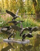 Brushed Gold Finish Flying Duck Sculpture ai illustration