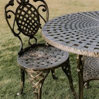 Close up of Lattice Design on Brushed Gold "Wentworth" Dining Set 