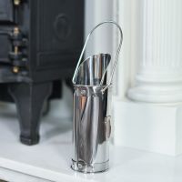 In situ photo of steel long fireside match holder