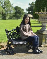 Scale image of black ornate outdoor bench