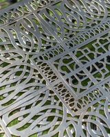 Close-Up of Ornate Pattern on Eight Seater Table & Chair Set