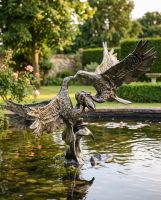 Cast Aluminium Eagles Fighting Sculpture ai illustration