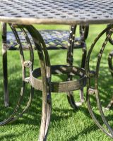 Close-Up of Leg Supports for Cast Aluminium "Flourish" Fleur-de-Lys Four Seater Table & Chair Set