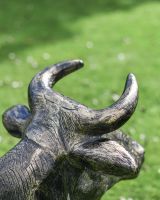 Close-Up of Horns on Cast Aluminium Laying Cow Sculpture