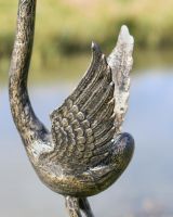 Close-Up of Open Wings on Flamingo Garden Sculpture