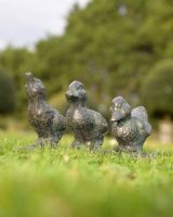 Close-Up of Cast Iron "Dynamic" Duck Family Trio Garden Sculpture Close-Up of Cast Iron "Dynamic" Duck Family Trio Garden Sculpture