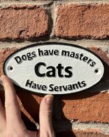 Cast Iron "Cats Have Servants" Sign