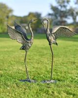 Cast Iron Freestanding "Fighting Flamingos" Garden Sculpture - Set of Two in Situ