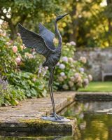 Cast Iron Freestanding "Head Up" Flamingo Garden Sculpture ai illustration Cast Iron Freestanding "Head Up" Flamingo Garden Sculpture ai illustration