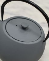 Close up of lid and handle detail on japanese teapot Close up of lid and handle detail on japanese teapot