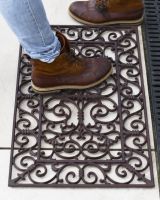Cast Iron Handforth Ornate Fleur-de-Lys Door Mat with Foot for Scale