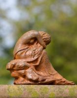 Back of Cast Iron Resting Woman Sculpture Back of Cast Iron Resting Woman Sculpture