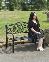 Scale image of intricate cast iron garden bench Scale image of intricate cast iron garden bench