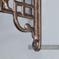 Close-up of the Fixing Holes on the Bottom of the Cherub Iron Shelf Bracket