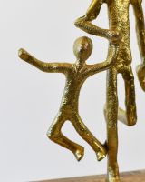 Close of up cast aluminium child detail on interior sculpture