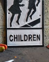 Close up of "Children" Cast Iron Information Sign finish 