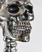 Close up of detailing on Chrome Skeleton face