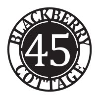 Circular Iron House Name Sign in Black