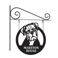 Close-Up of Circular Steel Boxer Dog Hanging House Name Sign Close-Up of Circular Steel Boxer Dog Hanging House Name Sign