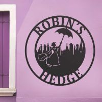 Circular Steel House Name Sign with Mary Poppins Motif Circular Steel House Name Sign with Mary Poppins Motif