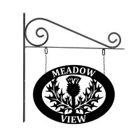 Close-Up of Oval Steel Thistle Hanging House Name Sign Close-Up of Oval Steel Thistle Hanging House Name Sign