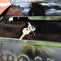 Close-up of the Key and Lock on the "Cityscape" Black Contemporary Post Box and Newspaper Holder