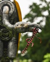 Close up of face detail on recycled metal art sculpture