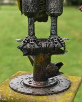 Close up of feet detail on scrap metal art sculpture