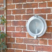 Classic Bulk Head Style Wall Mounted Light in Situ on a Brick Wall