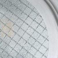 Close-up of the Porthole Style Glass in the Wall Light