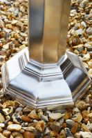 Close-up of the Base on the Antique Silver Armillary with Column