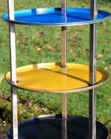 ‘Orbit’ Upcycled Oil Drum shelving Unit close up of vibrant oil drum lids to create shelving