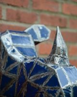 ‘Azure’ the Rhino Head Mount Wall Art mounted on brick wall close up on horn