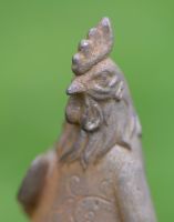 Close-Up of Cast Iron Gardening Rooster Sculpture Close-Up of Cast Iron Gardening Rooster Sculpture