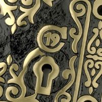 Close-Up Of The Black Infill On The Polished Brass Finish