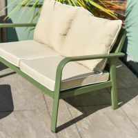 Close up of green metal arm detail on two seater outdoor sofa Close up of green metal arm detail on two seater outdoor sofa