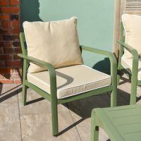 Close up of individual armchair on five person patio furniture set Close up of individual armchair on five person patio furniture set