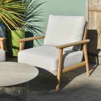 Close up of individual armchair with woven rope detailing outdoor lounge set