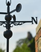 Close up of ornate arrow detail on Beehive Weathervane
