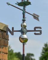 Close up of arrow detail on Verdigris Rooster Weathervane Close up of arrow detail on Verdigris Rooster Weathervane