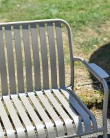 Close up of slatted back detail on two seater garden bench