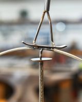 Close up of balancing element on skateboarder sculpture Close up of balancing element on skateboarder sculpture