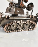 close up of base on tank sculpture close up of base on tank sculpture