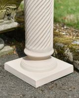 Close up of intricate barley twist detail on garden sundial column